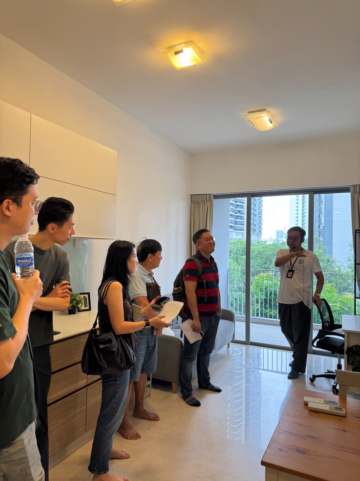 Clients viewing a residential unit as a Crestbrick agent walks them through it